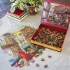 Peaceable Kingdom Cozy Library Pass Along Puzzle – 500-Piece with Shiny Foil Accents & Easel-Style Storage Box — Log Your Time Then Pass This Puzzle Along to Friends — for Kids Ages 8 & Up