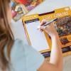 Peaceable Kingdom Cozy Library Pass Along Puzzle – 500-Piece with Shiny Foil Accents & Easel-Style Storage Box — Log Your Time Then Pass This Puzzle Along to Friends — for Kids Ages 8 & Up